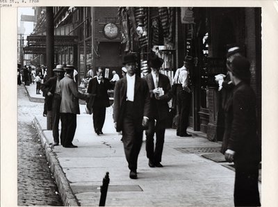 Pedestrians on the Sidewalk in Front of New Lindell Hotel and Fellhauer Wine Shop at 705 6th Street and 707 6th Street by Charles Clement Holt